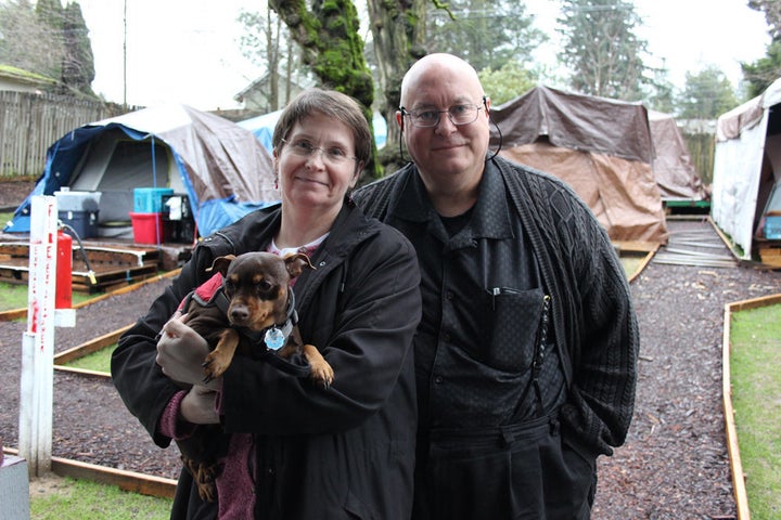 Kim and Brad Lancaster and their dog, Sofie.