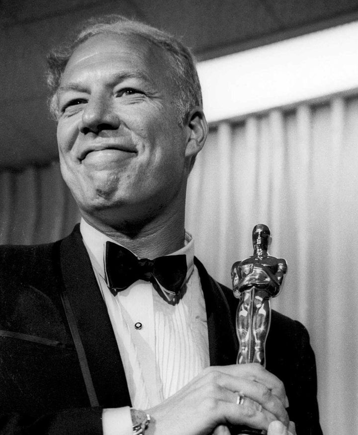 George Kennedy poses April 10,1968 with his Oscar in Santa Monica, Calif, after he was presented with it as Best Supporting Actor, for his role in "Cool Hand Luke." 