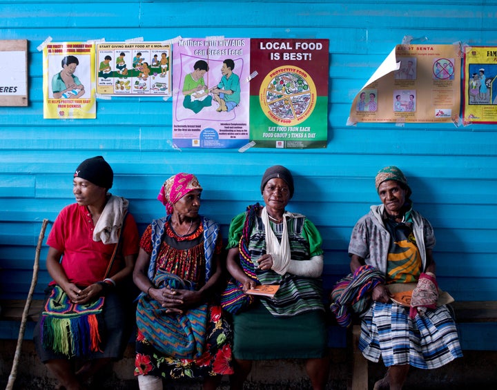 Aoife Ní Mhurchú, a nurse working for Doctors Without Borders (MSF) in Papua New Guinea, says roughly a third of MSF's patients have been severely injured by family and sexual violence. Women await treatment outside the surgical ward at Tari Hospital in Papua New Guinea.