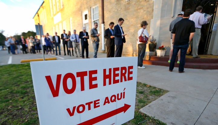 Voters line up to cast their ballots on Super Tuesday, March 1, 2016, in Fort Worth, Texas. Hopefully, they all have an acceptable form of government-issued photo identification.