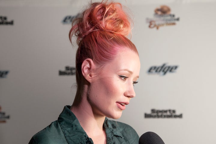 Iggy Azalea Reveals She's Recovering From Back Surgery After Not