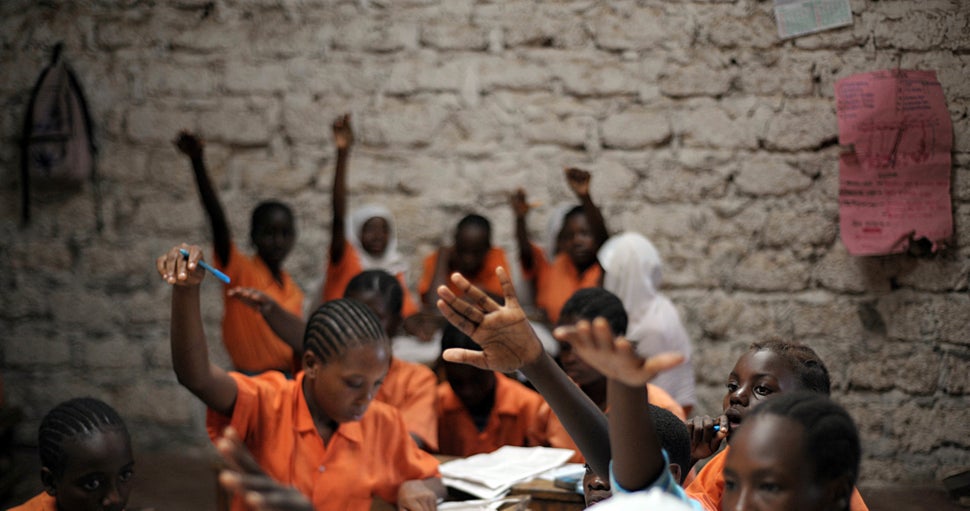 Schoolgirls participate in a lesson in Kilifi, Kenya on June 31, 2010. The students are part of an initiative called&nbsp;"Mo