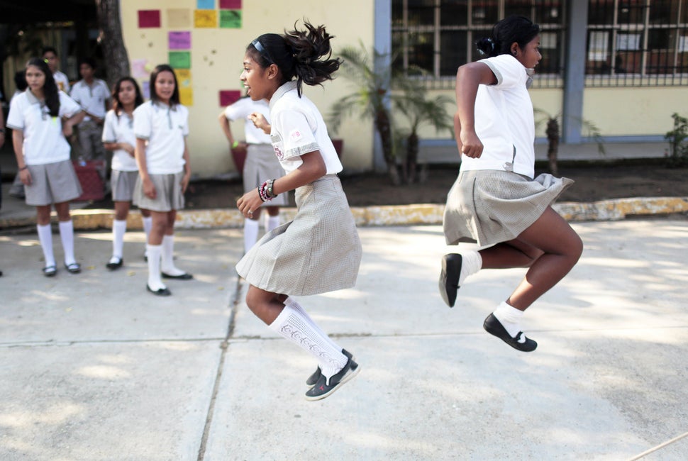 Children play during a break after returning to school following a two-months strike of teachers due to criminal threats, in 