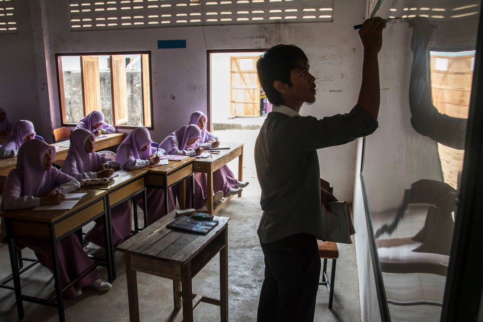 Young female students in a "pondok," a school providing general and religious studies on June 29, 2015 in Narathiwat, Thailan