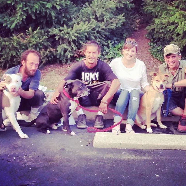 Beth Green (second from right) of My Dog Eats First with a few homeless individuals she’s helped.