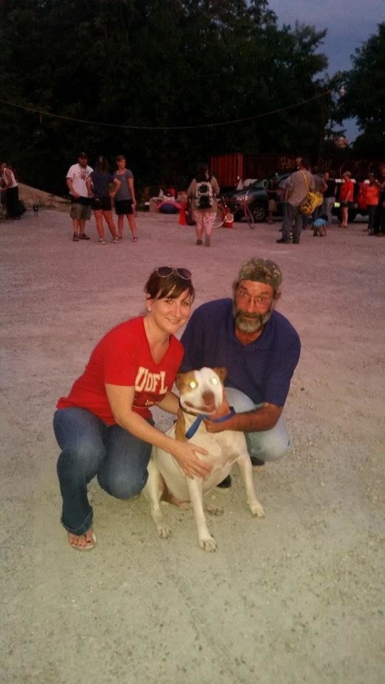 Green with the first homeless person she ever worked with -- and still does -- Tony and his dog Rocky.