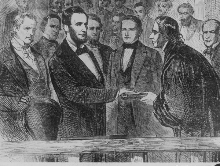 An engraving depicts Chief Justice Taney administering the oath to President Abraham Lincoln at his inauguration on March 4, 1861.