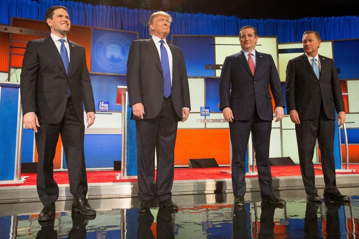 Sen. Marco Rubio (R-Fla.), Donald Trump, Sen. Ted Cruz (R-Texas) and Ohio Gov. John Kasich pose for a photo at the beginning of the Republican presidential debate in Detroit on March 3, 2016.