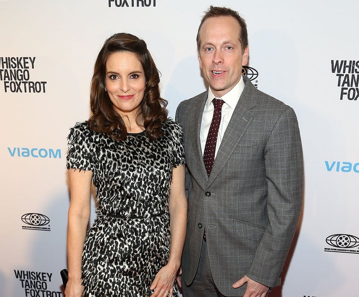 Tina Fey and Robert Carlock attend a screening of "Whiskey Tango Foxtrot" on Feb. 23, 2016.