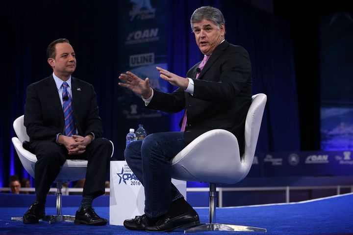 RNC Chair Reince Priebus (left) talks with Sean Hannity at CPAC March 4, 2016.
