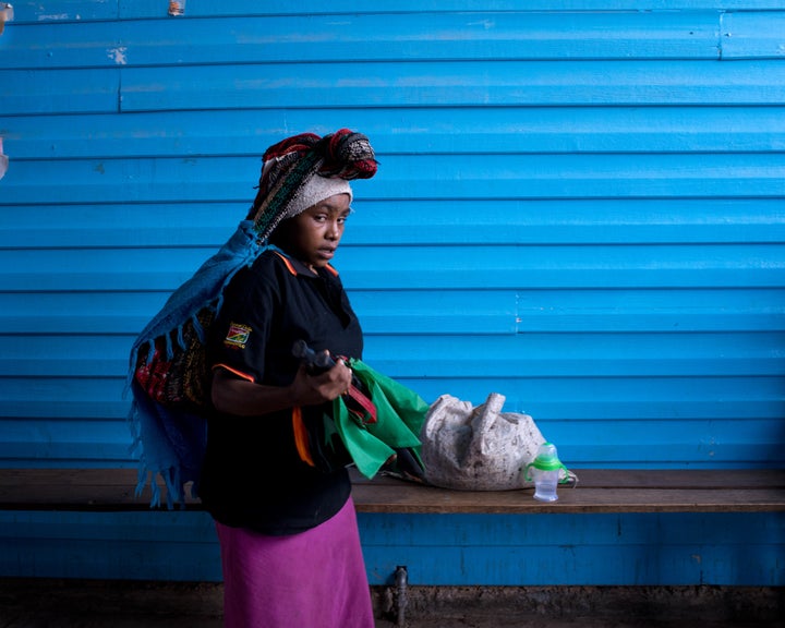 A young woman arrives with her twins at Tari Hospital in Papua New Guinea's Hela Province after walking for hours. Access to healthcare is low in the South Pacific nation, while rates of domestic and sexual violence are alarming.