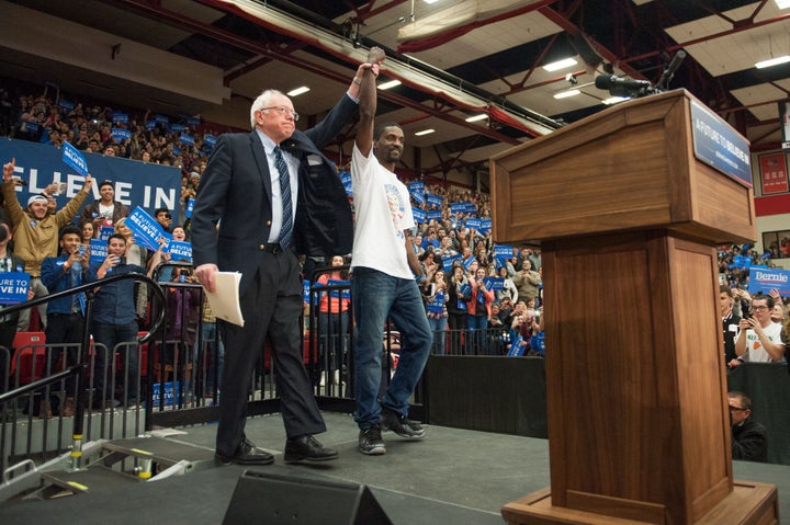 Sen. Bernie Sanders (I-Vt.) with activist Bruce Franks, who announced at the rally inside Southern Illinois University Edwardsville basketball stadium that he would run as a state representative.