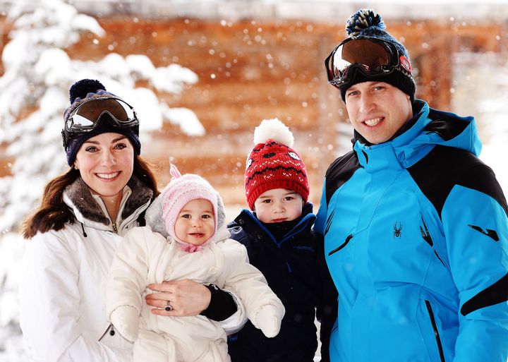 The Duke and Duchess of Cambridge pose with their children, Princess Charlotte and Prince George, during a short vacation in the French Alps.