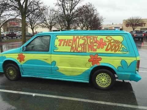 Police say a woman took cops on a high-speed chase while driving this vehicle painted to look like Scooby-Doo's "Mystery Mach