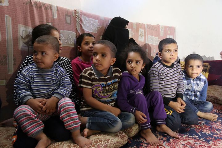 A Syrian Refugee family, of two women living together with their nine children, on November 1, 2015 in Mafraq, Jordan.