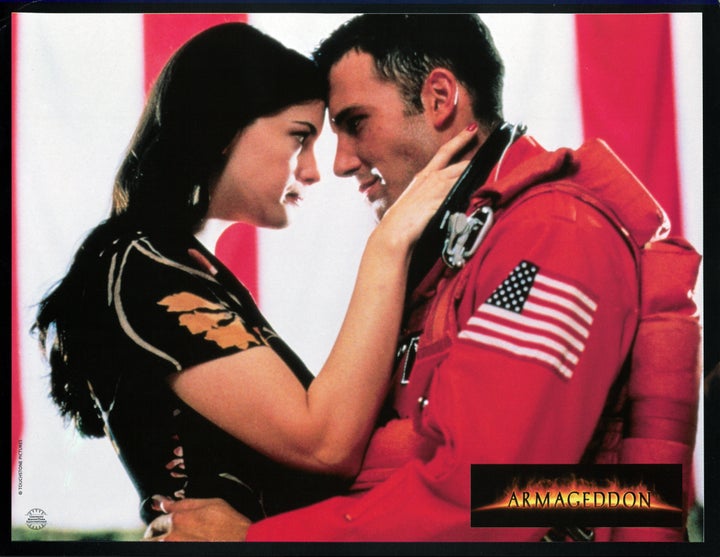 Liv Tyler looking into the eyes of Ben Affleck in a scene from the film 'Armageddon', 1998.