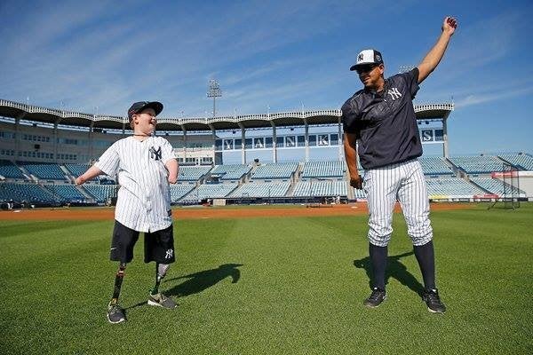 10-year-old Landis Sims is seen working out with Yankees star Alex Rodriguez during spring training in Florida on Monday.