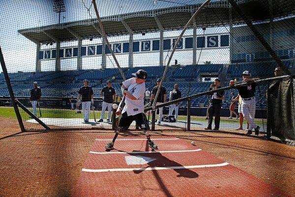 Landis uses a special prosthetic on his arm to hold the baseball bat, allowing him to send the balls flying.