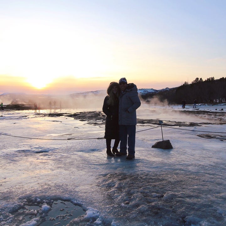 A girl, a guy and a geyser. 