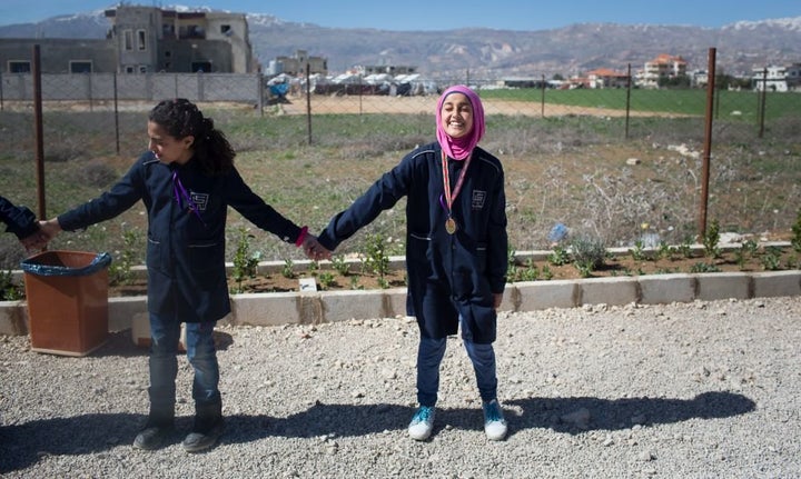 Students practice "dabke" during International Women's Day celebrations in the Bekaa Valley in 2016.