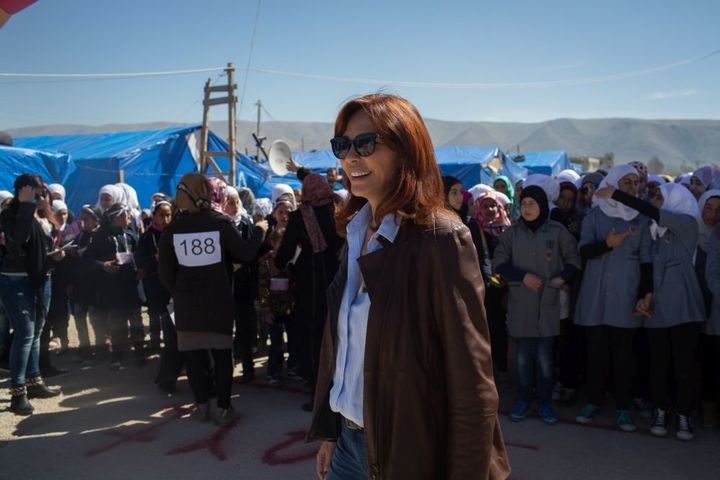 Nora Jumblatt, founder of the Kayany Foundation, helps prepare for a race to kick off International Women's Day celebrations in Bar Elias on March 7, 2016.