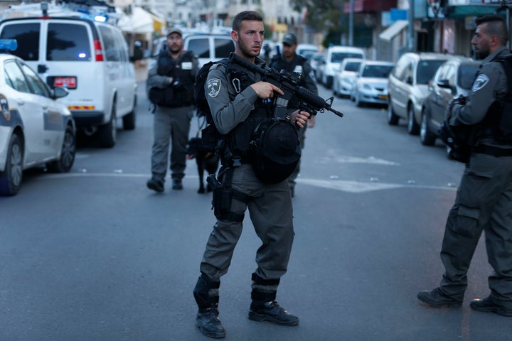 Israeli security forces gather in East Jerusalem's following a shooting attack on March 8, 2016. There four attacks by Palestinian assailants in different locations on Tuesday.