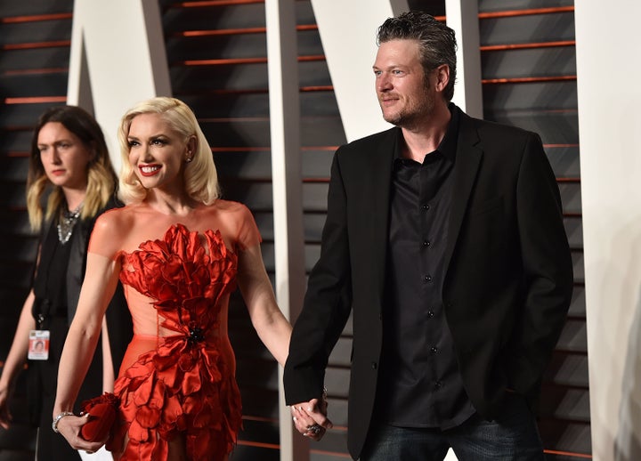 Recording artists Gwen Stefani (L) and Blake Shelton arrive at the 2016 Vanity Fair Oscar Party Hosted By Graydon Carter on February 28, 2016 in Beverly Hills, California.