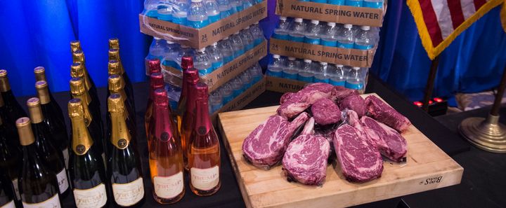 Steaks, wine, champagne and water at Trump's event.