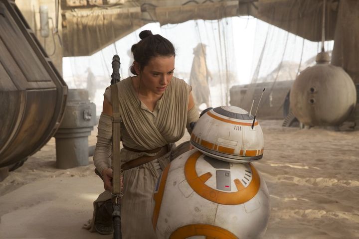 Daisy Ridley as Rey, with the true star of 'The Force Awakens', BB8