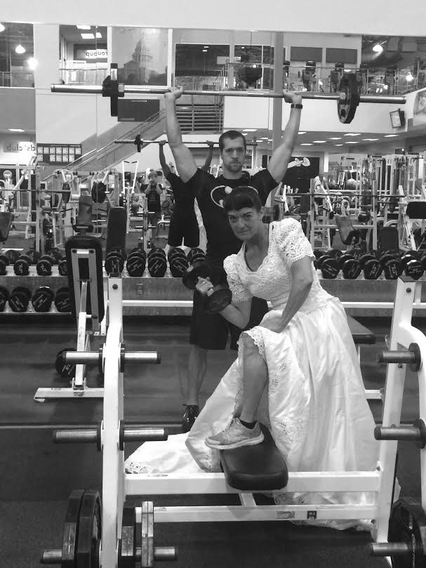 Herrera at the gym in her wedding gown.