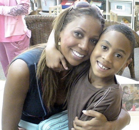 Holly with RJ several years ago. The Peetes refer to the day of RJ's diagnosis as the "never day," after hearing from the doctor all of the things their son would never do.