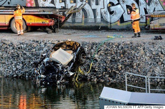 The band's badly damaged car was removed from the canal 