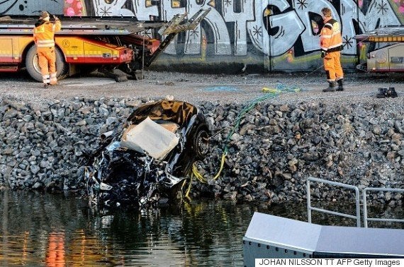 The band's badly damaged car was removed from the canal 