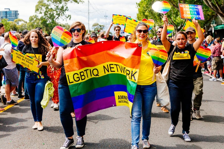 Members of the Amnesty International LGBTIQ network march during the MidSumma festival Pride march in Australia, calling for marriage equality