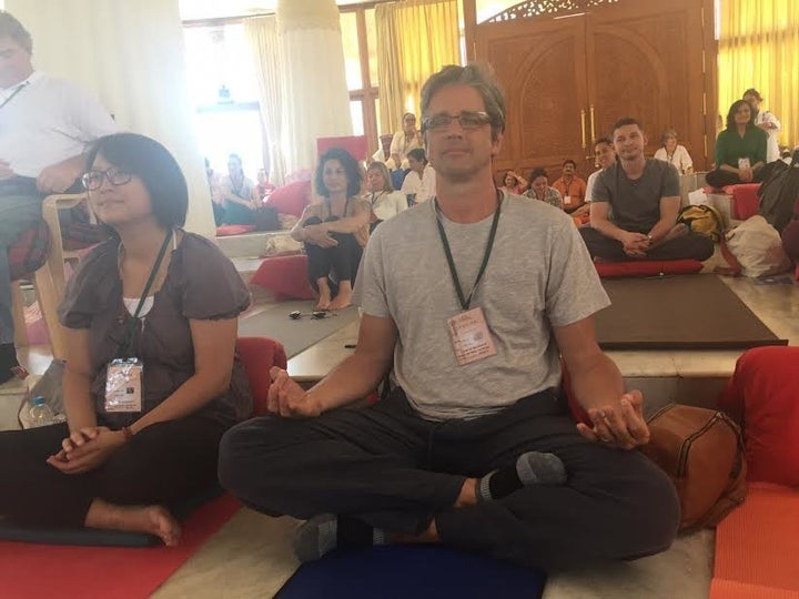 Louis Gagnon, president of Ride.com, meditates at the Art of Living ashram in Bangalore, India.