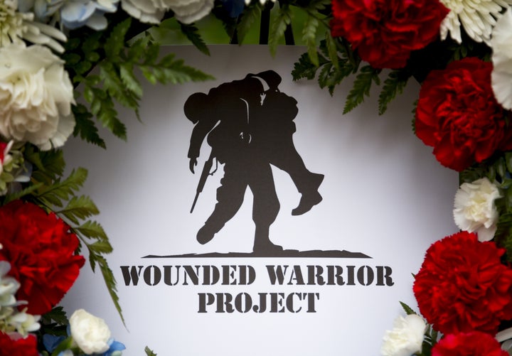 A wreath from the Wounded Warrior Project is seen at the Eternal Light Monument on Veterans Day. The organization fired its C