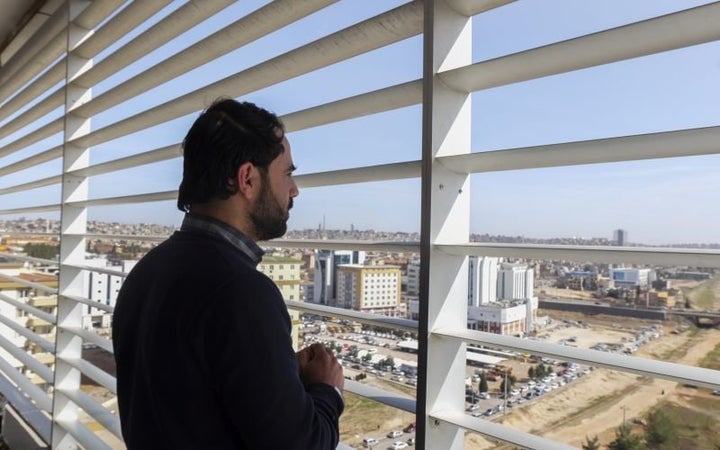 Dr. Hatem, the Director of Aleppo's Children Hospital, overlooks Gaziantep during a brief family visit to Turkey as Aleppo was being encircled in a significant Syrian government campaign to overtake the city and its countryside in February 2016.