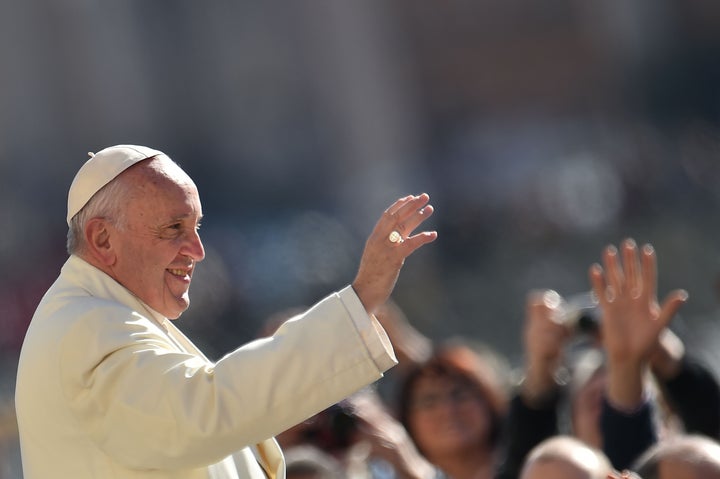 Pope Francis greets the crowd during his weekly general audience at St Peter's square on March 2, 2016 at the Vatican.