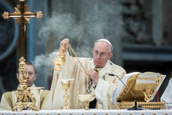 Pope Francis celebrates a Mass for the Feast of the Chair of Peter and the Holy Year of Mercy of the Roman Curia in St. Peter's Basilica at the Vatican.