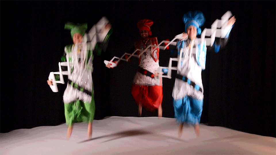CU Bhangra dancers perform with a "sap," a wooden prop that they can expand and contract in time to the music.