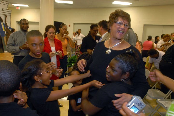 Dorothy Counts-Scoggins several years ago with Charlotte students.