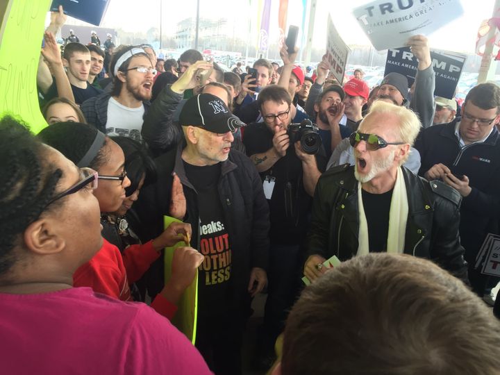 Ed Honeywill (wearing sunglasses), a Trump supporter, quarrels with protesters at a rally in Cleveland, Ohio.