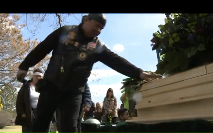 Bikers lined up to pay their respects to the 5-year-old boy, some leaving bandanas on his casket.