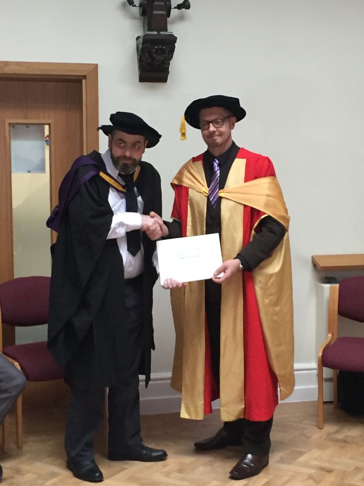 Max Neill (left) being presented with his degree at St Catherine's hospice in Lancashire just days before he died of bowel cancer