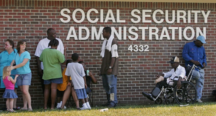 Social Security recipients displaced by Hurricane Katrina lined up for hours at one of the Baton Rouge, Louisiana, offices in September 2005.