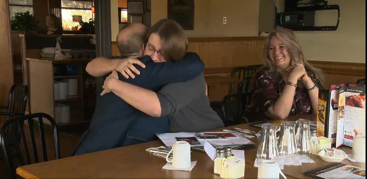 Sikorski hugging Boissonnaul while Shelley Bramhoff Sikorski watches the beautiful moment.