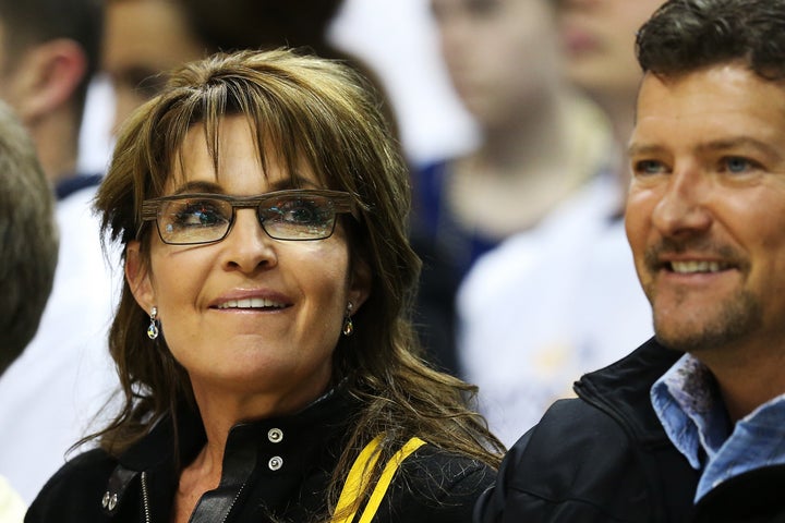 Sarah Palin and her husband Todd, right, pictured together in 2013. 