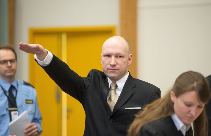Mass killer Anders Behring Breivik gave a Nazi salute at the start of a court case in Skien, Norway, on Tuesday. His lawyers