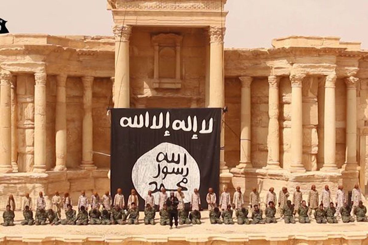 A screenshot of a video purporting to show the simultaneous execution of Isis captives at Palmyra