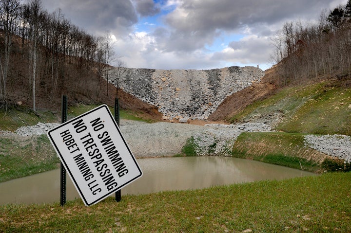 Photo taken in Mud, West Va., a town that is virtually gone now due to the coal operation having altered the landscape. The area in the center once was an open valley with a stream (it flowed to the right of frame) but is filled in from debris from a nearby mountain top coal removal site.